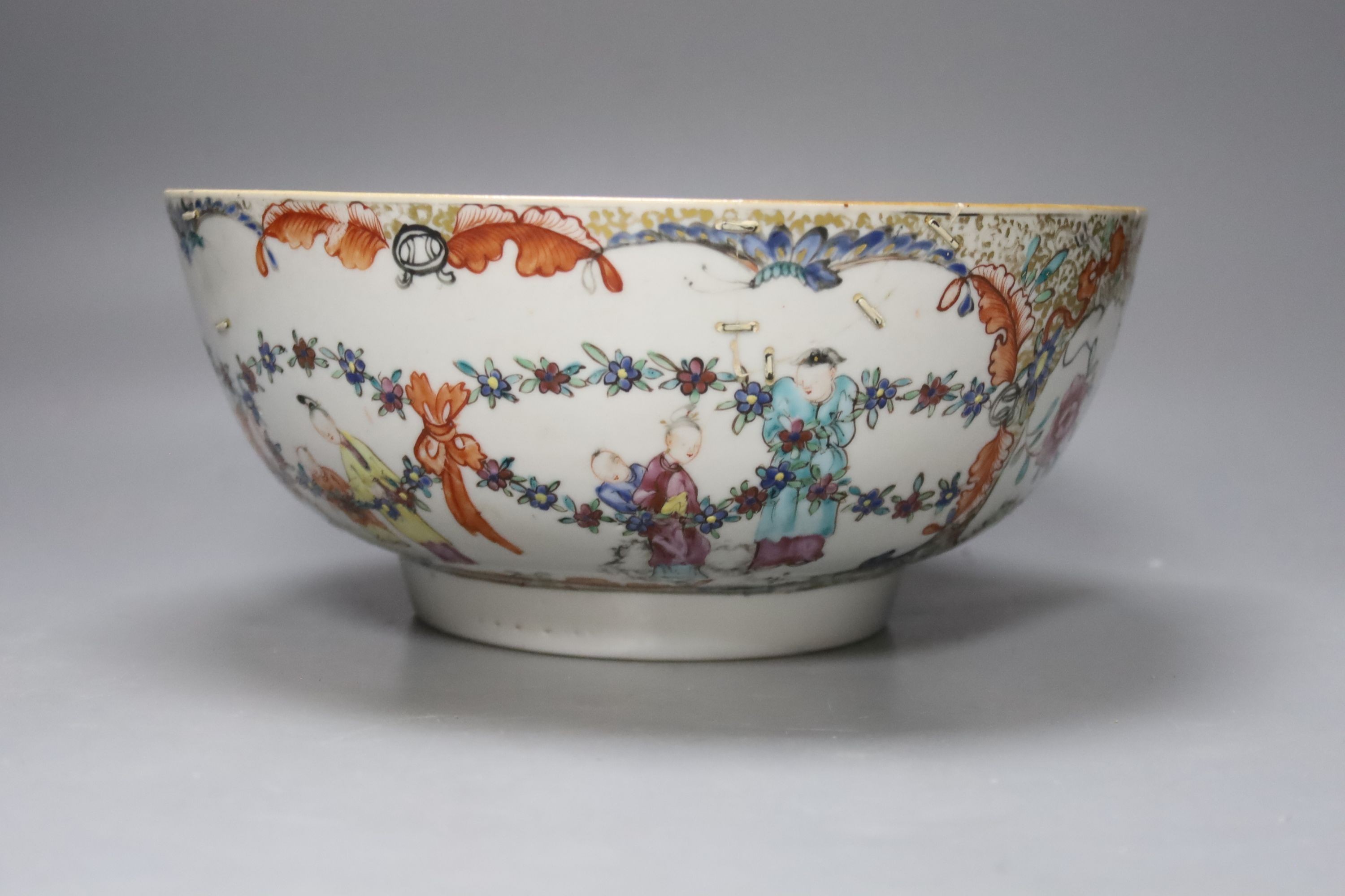 A Chinese blue and white pillow, an 18th century Chinese export bowl, diameter 26cm, and three similar plates